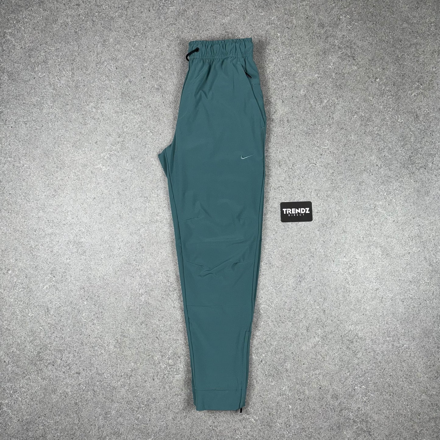 NIKE UNLIMITED TRACKSUIT - MINERAL