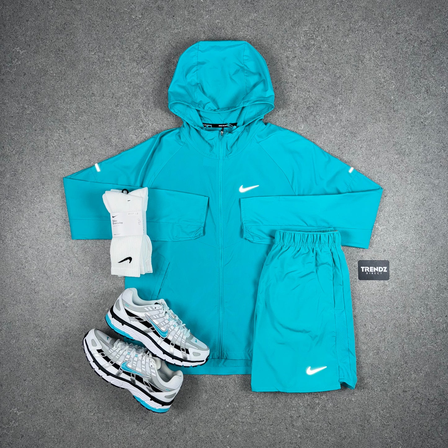 NIKE REPEL WINDBREAKER & SHORTS SET - AQUA