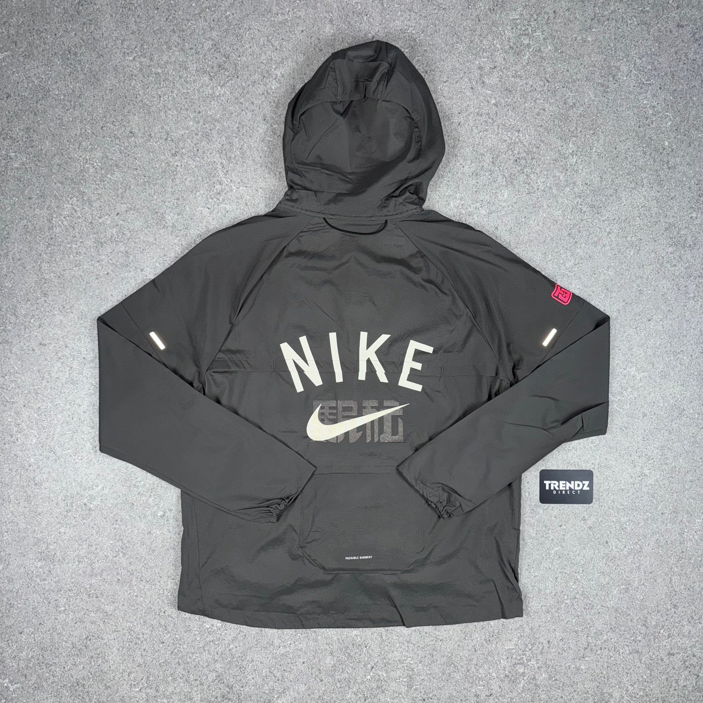 NIKE UV WINDBREAKER - CHARCOAL