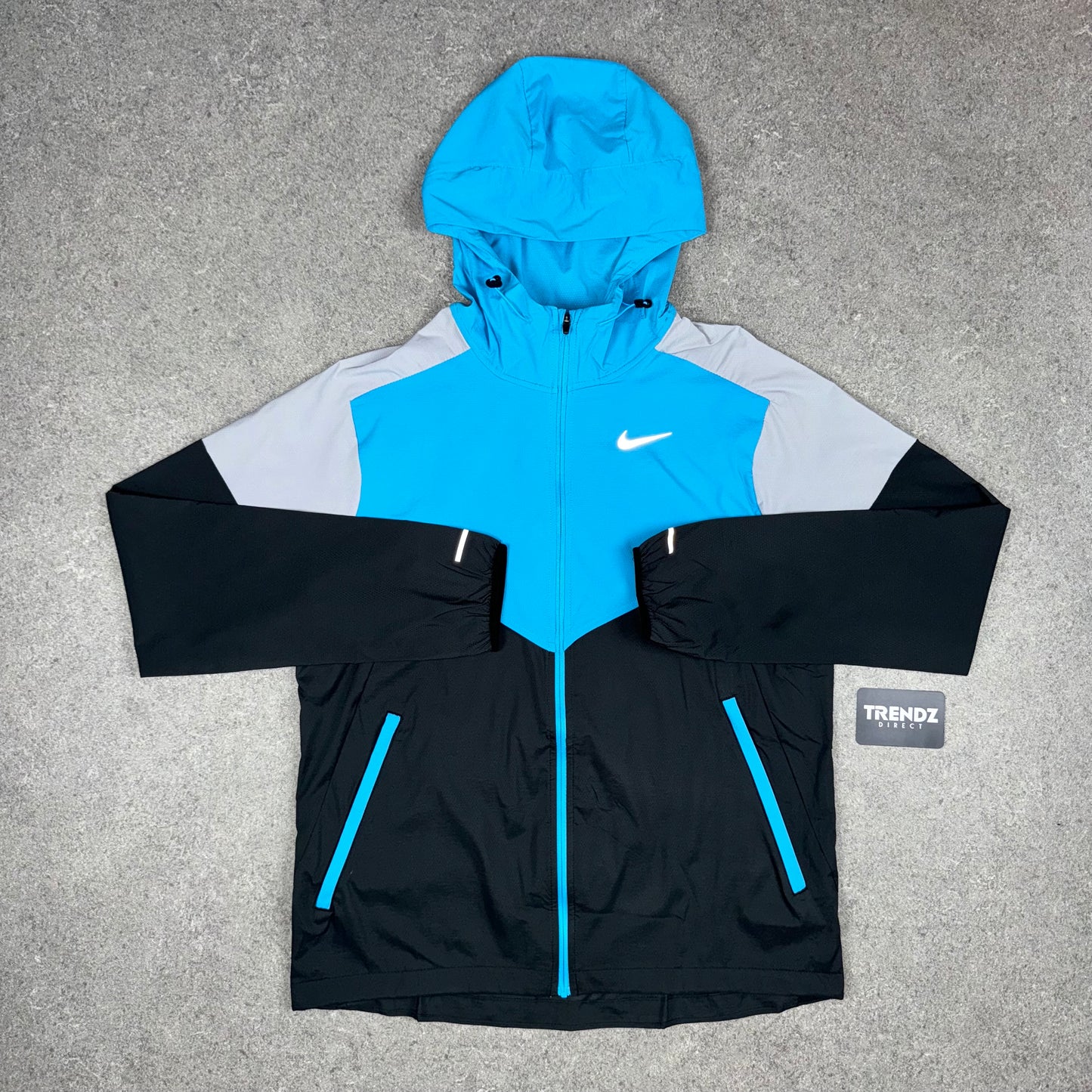 NIKE UV WINDBREAKER - BALTIC BLUE