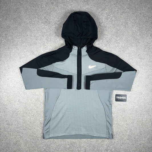 NIKE THERMA SPHERE JACKET -  GREY