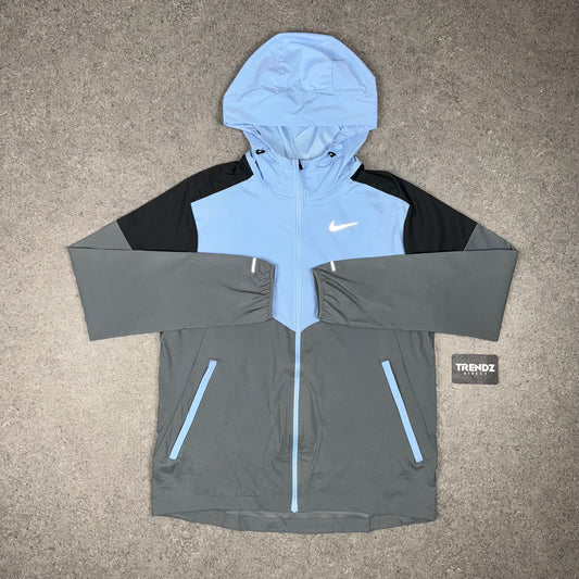NIKE UV WINDBREAKER - SKY BLUE/GREY